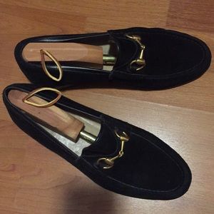 Men’s Gucci suede loafers.